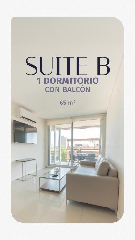 a living room with a couch and a table at START Villa Morra Rent Apartments in Asunción