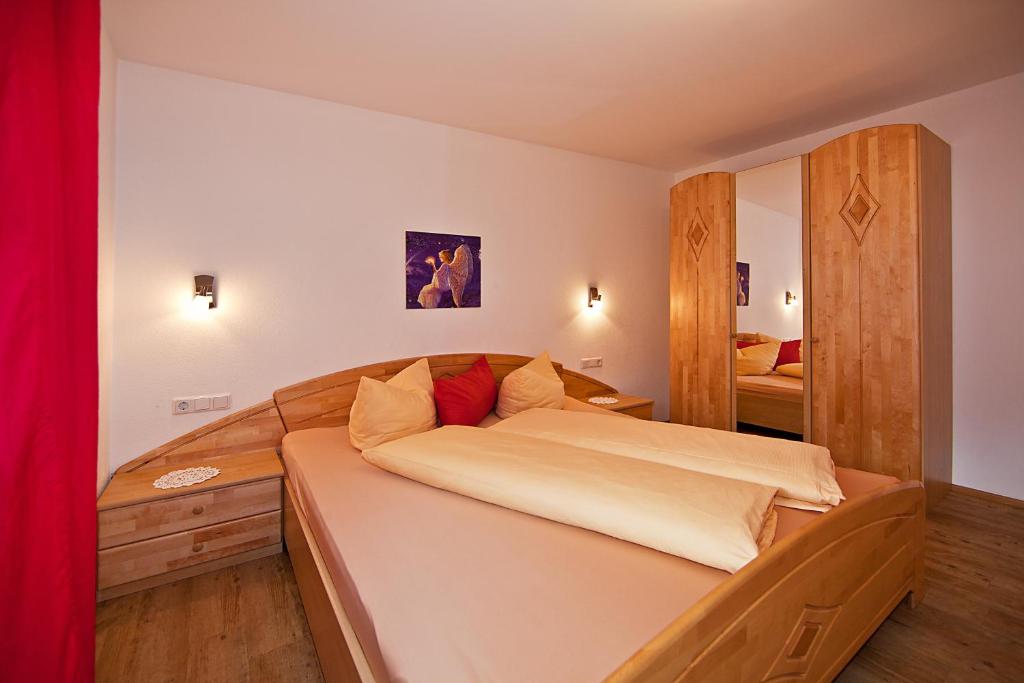 Postel nebo postele na pokoji v ubytování Apartment Oberbichl