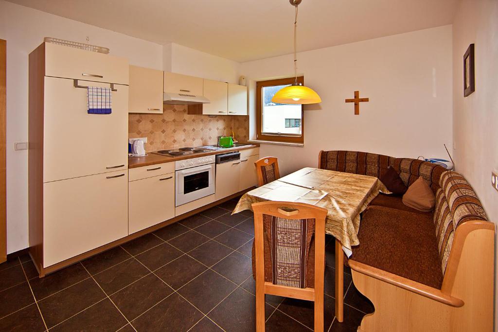 Kuchyň nebo kuchyňský kout v ubytování Apartment Oberbichl
