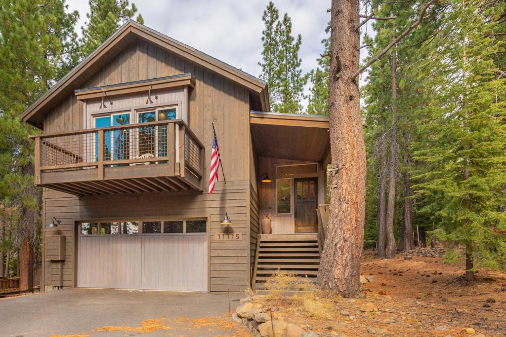 a house in the woods with a tree at 4BR Home w/ 2 Decks, Near Lake & Ski Resorts in Truckee