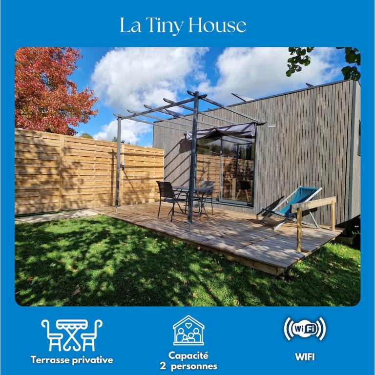 a patio with a table and a bench at Tiny House, 12mn du Parc, Terrasse & Clim in Châteaumur
