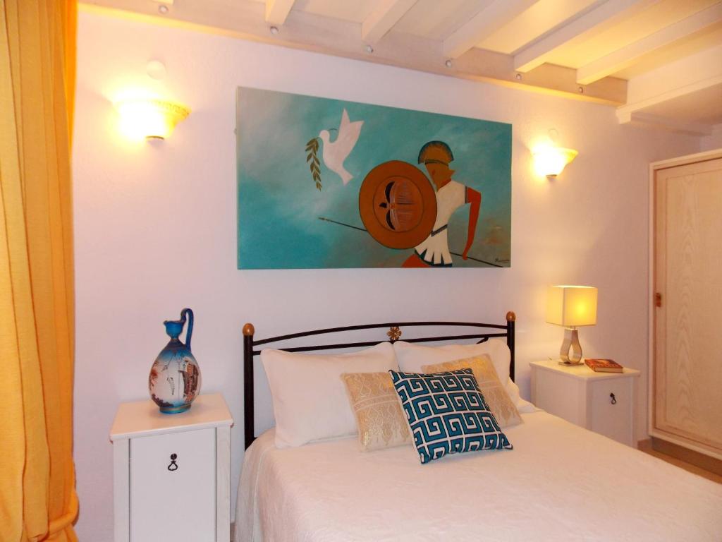 Postel nebo postele na pokoji v ubytování Skiathos Driades