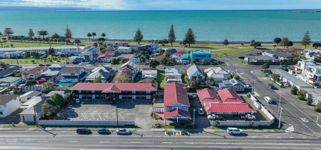 an aerial view of a town next to the ocean at Albatross Motel in Napier