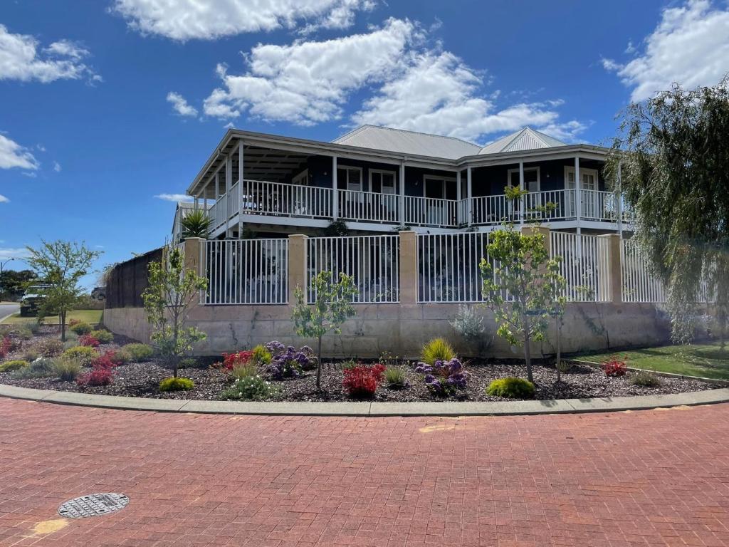 a house with a garden in front of it at Beach Haven in Bunbury