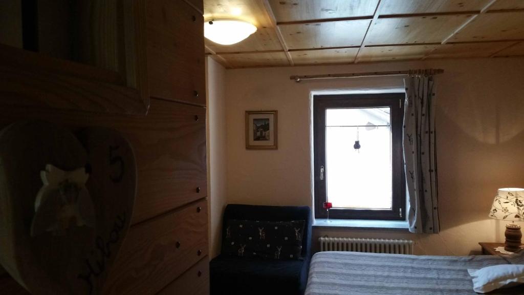 A bed or beds in a room at Maison Du-Noyer Chambres et Tables d'Hotes