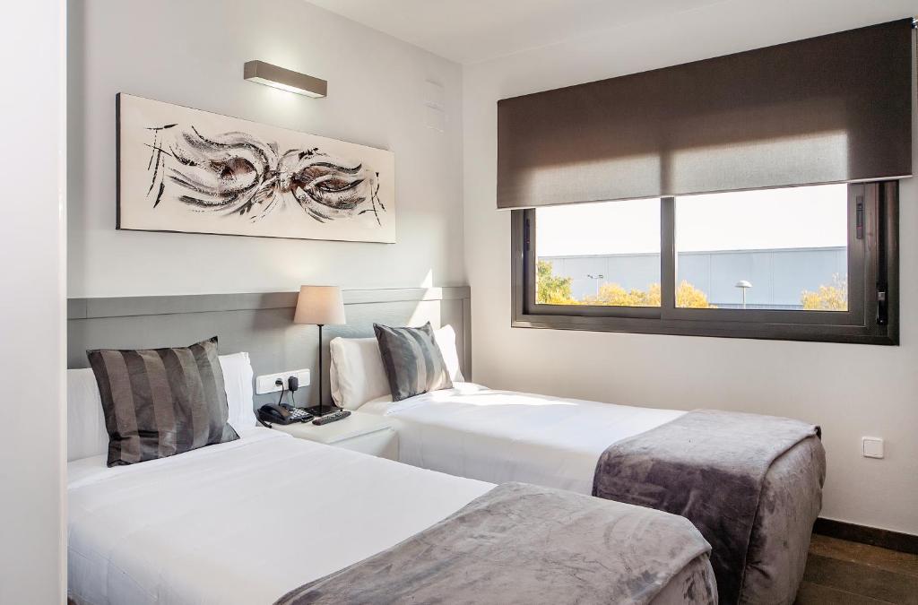 Postel nebo postele na pokoji v ubytování HOTEL SANT PERE ll HSPII