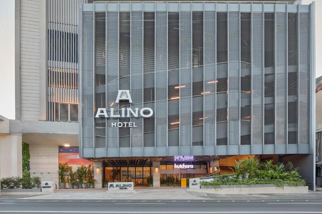 a building with an ativo hotel sign on it at Alino Hotel in Manila