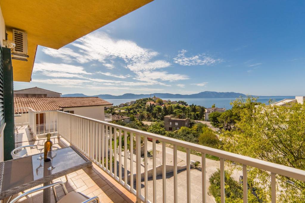 a view from the balcony of a house at Apartmani More in Gradac