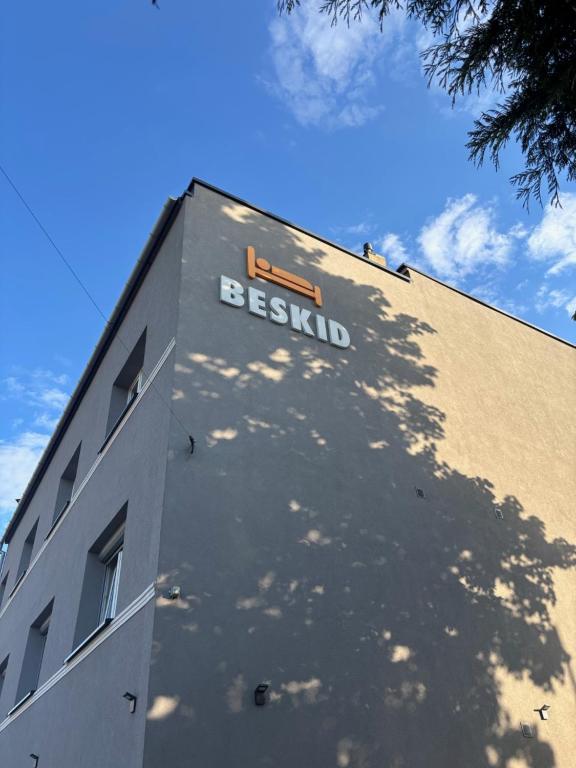 a building with a sign on the side of it at BeskidPark in Bielsko-Biała