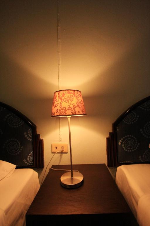Postel nebo postele na pokoji v ubytování Chaba Chalet Hotel