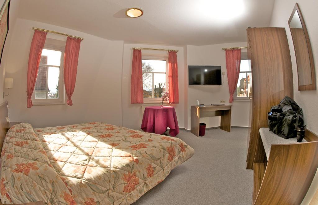 Postel nebo postele na pokoji v ubytování Hotel Weberhof