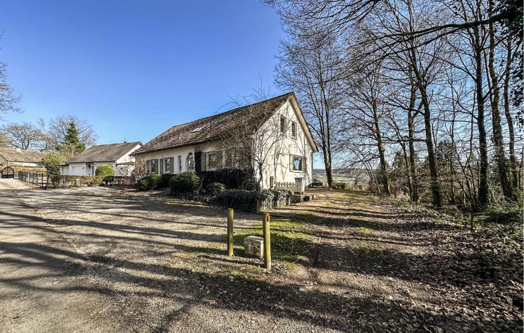 an old house on the side of a road at 2 Bedroom Nice Home In Rendeux in Rendeux