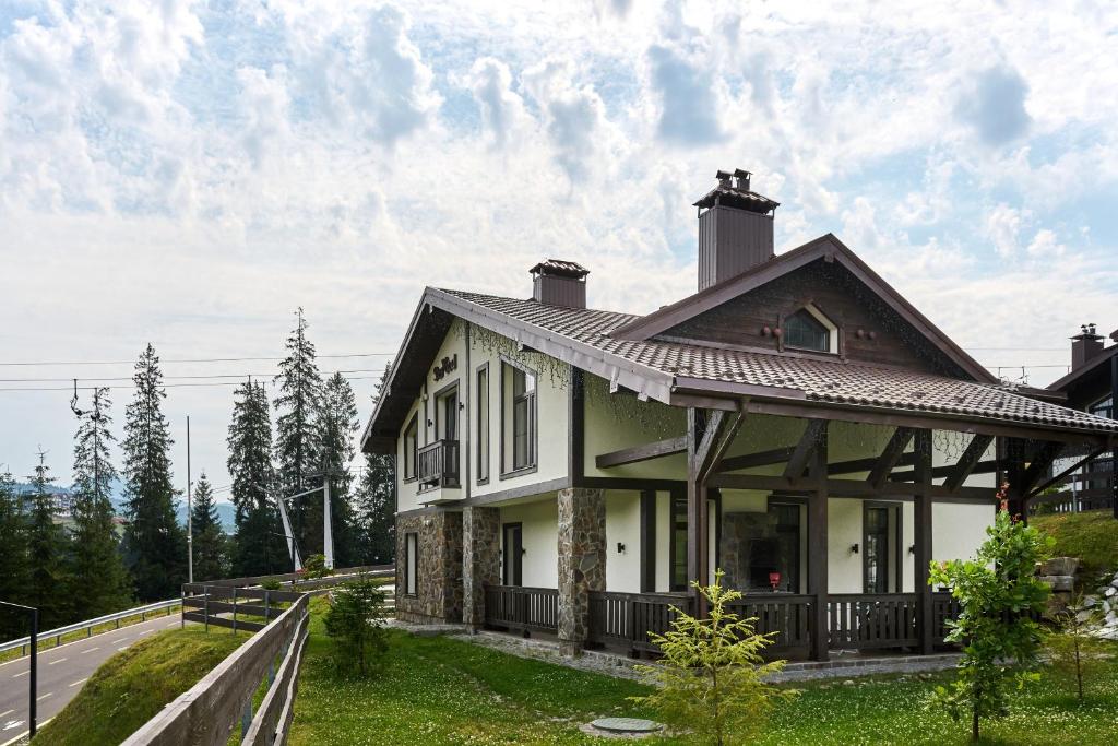 a house on the side of a road at Sherwood Chalet in Bukovel