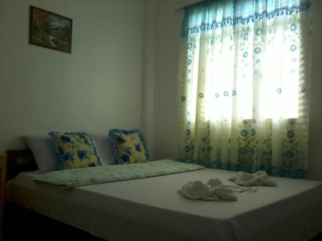 Postel nebo postele na pokoji v ubytování Diamond Lodging house