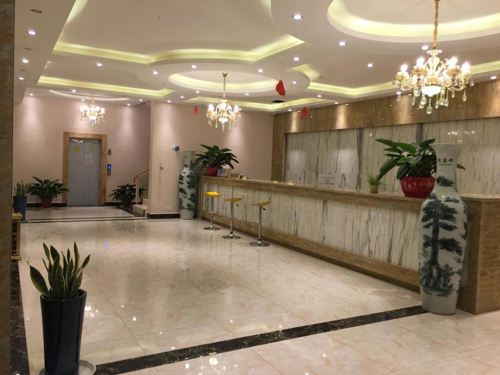 Vstupní hala nebo recepce v ubytování Bai Nian Sheng Shi Hotel