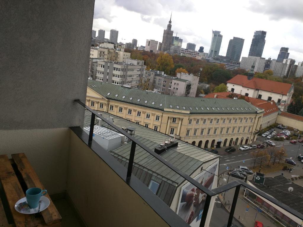 Nespecifikovaný výhled na destinaci Varšava nebo výhled na město při pohledu z apartmánu