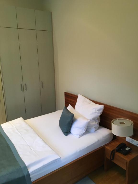 Postel nebo postele na pokoji v ubytování Hotel Schloss Rabenstein