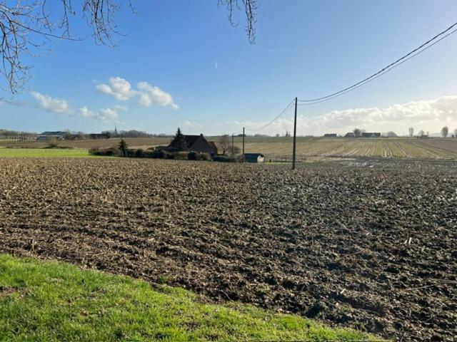 a field with a soccer ball in the middle at Ons Heerens Boompje in Poperinge