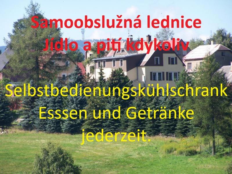 a picture of a house in a field at U Pohody in Kovářská