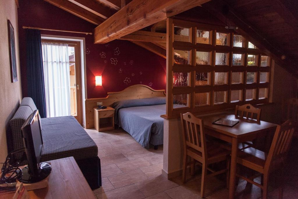 Postel nebo postele na pokoji v ubytování Residence Les Fleurs