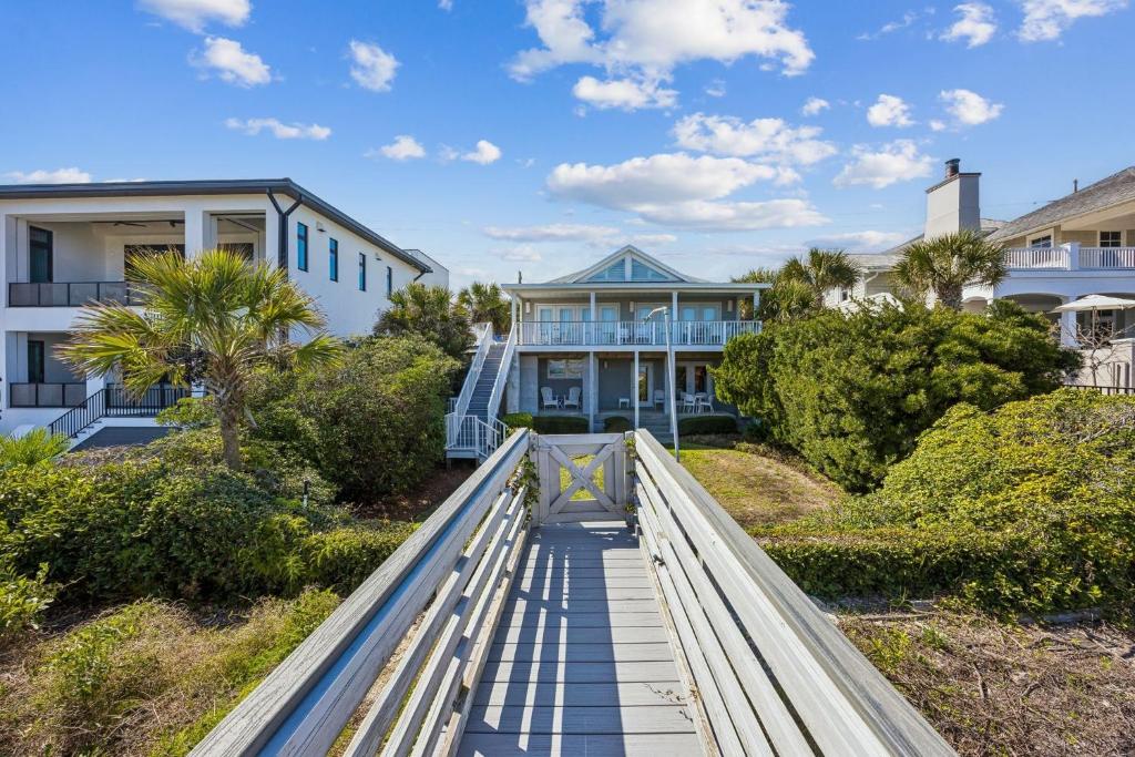 a walkway leading to a beach house at Dog Friendly Ground Level Duplex in Fernandina Beach