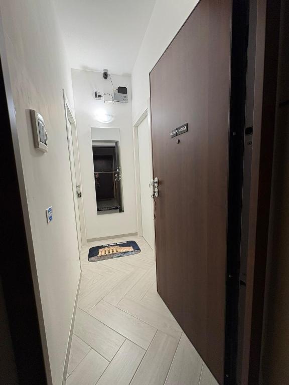 a hallway with a door leading to a room at OLYMPO HOUSE senza balcone in Agrigento