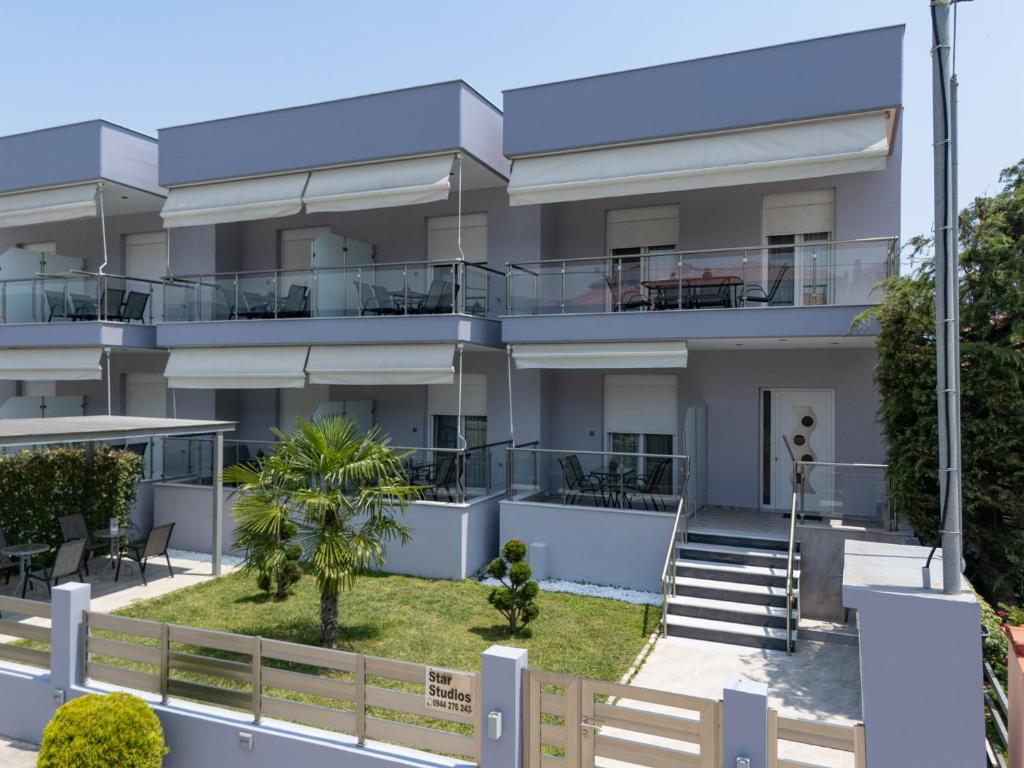 an exterior view of a building with a balcony at Star Studios in Stavros