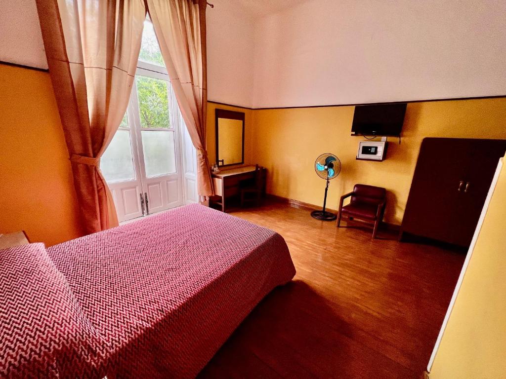 TV in/ali zabaviščno središče v nastanitvi Hotel Isabel