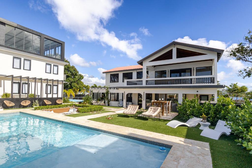 an exterior view of a house with a swimming pool at 623 Boquerón Villas in Boqueron