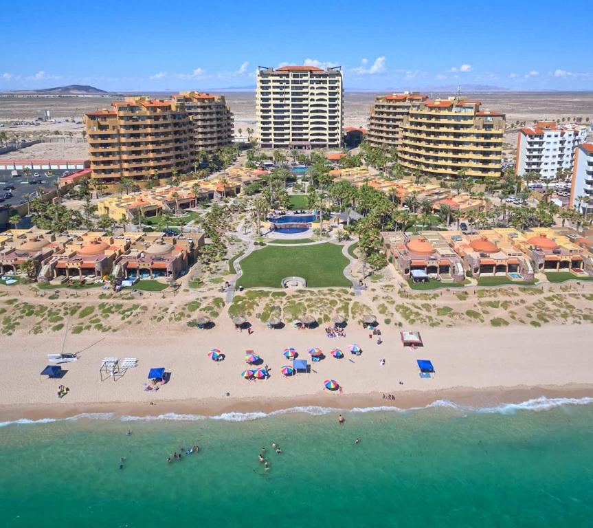 an aerial view of a resort with a beach at Bella Sirena Beachfront Resort Condo D603 in Puerto Peñasco