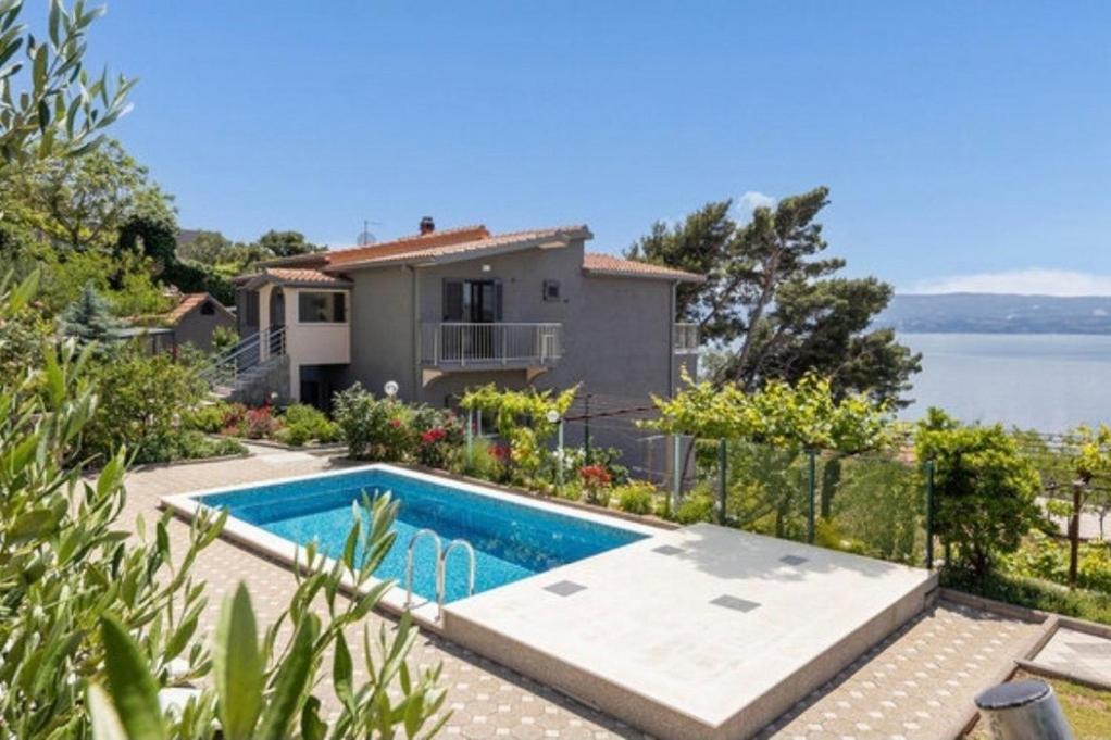 Family friendly house with a swimming pool Omis - 25197