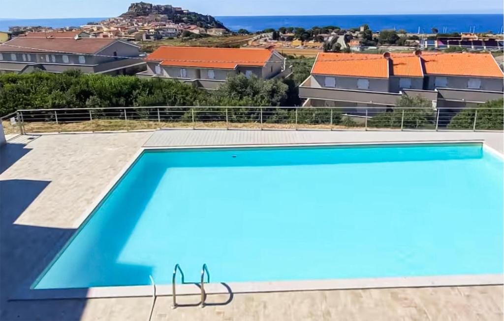 a view from the roof of a house with a swimming pool at Bilo Panorama in Castelsardo
