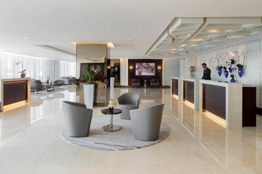 TV a/nebo společenská místnost v ubytování Jumeira Rotana – Dubai