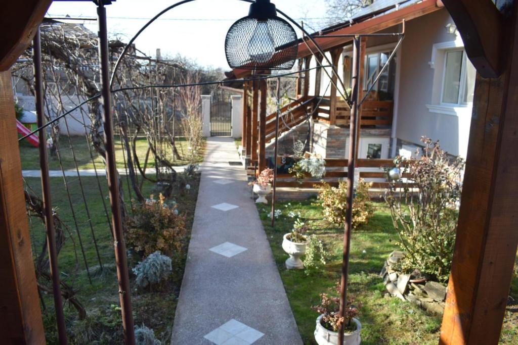 a walkway in the yard of a house at Hello Retezat in Râu de Mori