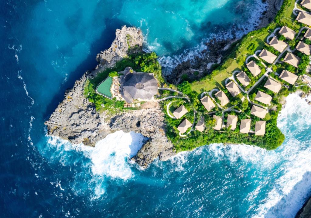 an aerial view of an island in the ocean at ARNA Suites and Ocean Lounge in Nusa Lembongan