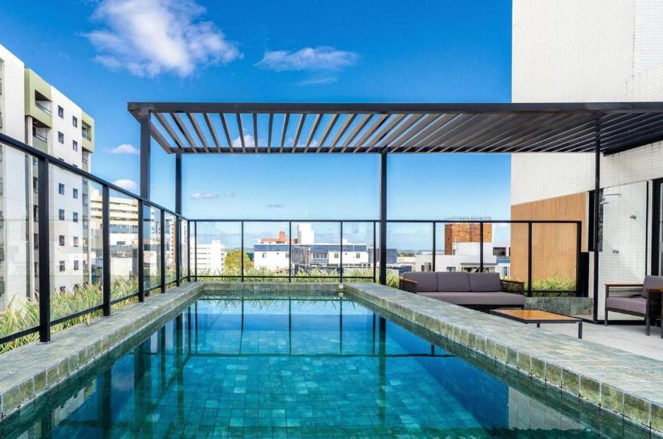 a swimming pool on top of a building at Apartamento Flat, Incrível, 250 M da Praia in Cabedelo