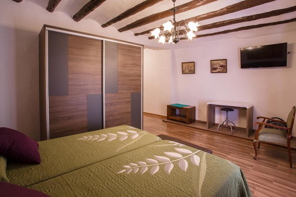 Postel nebo postele na pokoji v ubytování B&B Casa Forcada