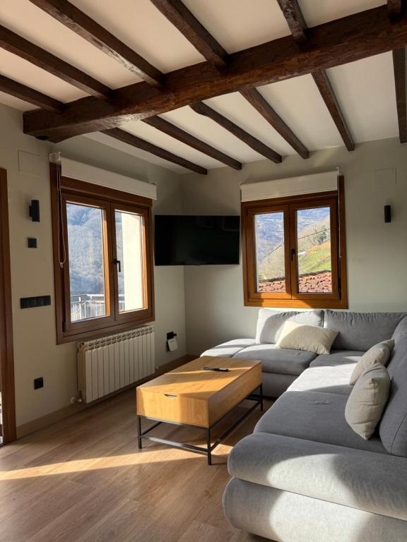 a living room with two couches and a coffee table at El Sueño de Celia 1 in Doña Juandi