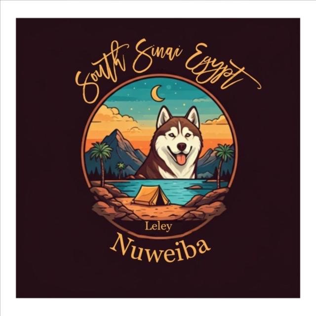 a logo of a wolf with a boat and a sunset at Leley Camp in Nuweiba