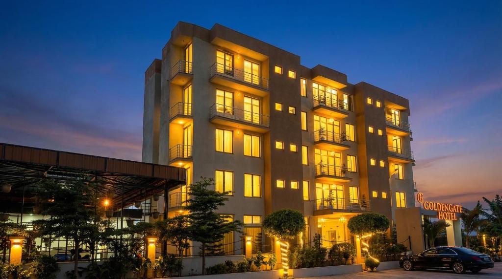 a large building with lit up windows at night at Golden Gate Hotel Hawassa in Āwasa