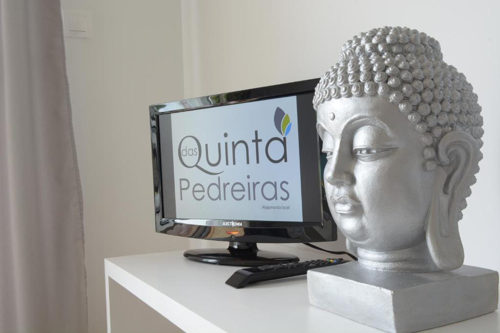 TV a/nebo společenská místnost v ubytování Quinta das Pedreiras