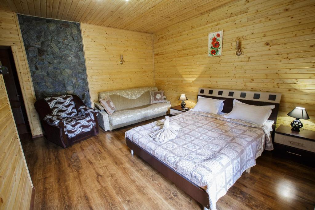 Postel nebo postele na pokoji v ubytování Anastasiya GOLD