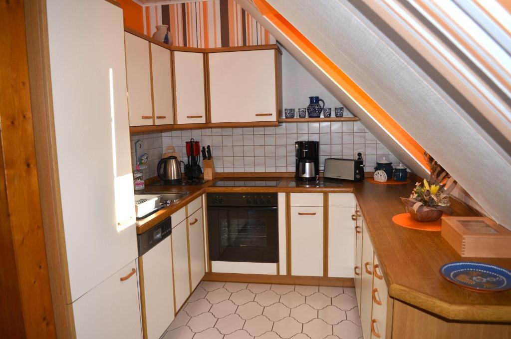 Kuchyň nebo kuchyňský kout v ubytování Ferienwohnung Rennsteigblick