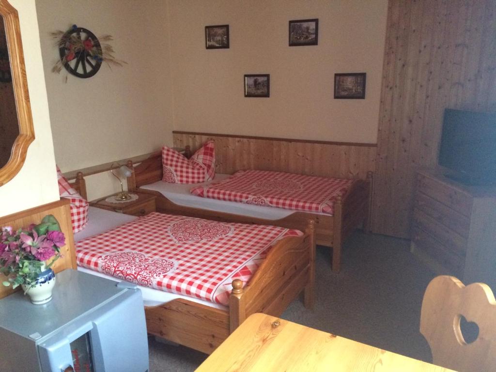 Postel nebo postele na pokoji v ubytování Pension Zum Bauernstübl