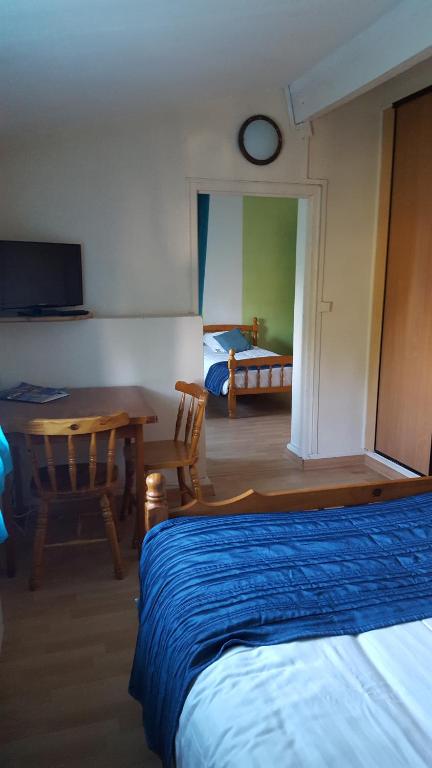 Postel nebo postele na pokoji v ubytování Hotel Ô Fil de L'ô