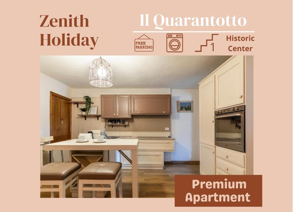 a kitchen with a table with stools in it at Centro storico - 2 min da Piazza Grande - Free Parking in Arezzo