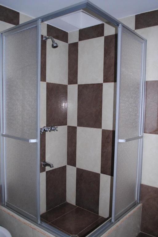Koupelna v ubytování Hotel Caluva