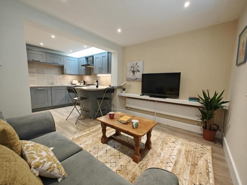 a living room with a couch and a table at 1 Bed in Hexham oc-g37537 in Hexham
