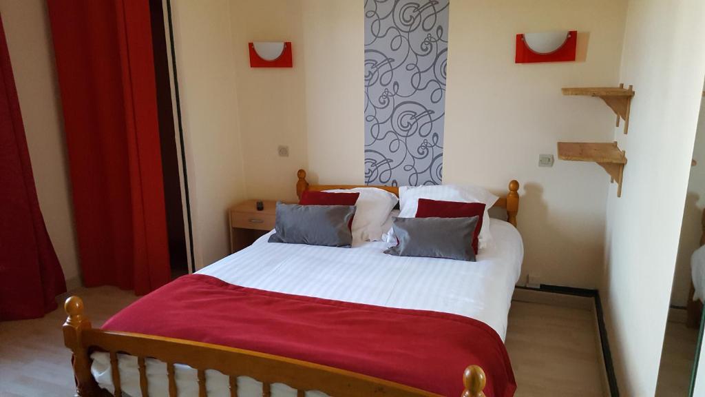 Postel nebo postele na pokoji v ubytování Hotel Ô Fil de L'ô