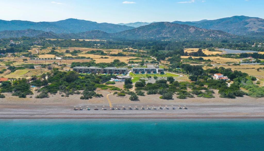 an aerial view of a resort on the beach at Aethrion Villas & Suites in Gennadi